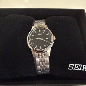 Seiko Woman’s Silver Watch with Black Dial